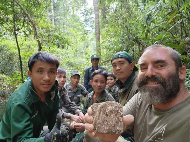 Lee and Lao tracker candidates with a plaster cast made from a possible Saola track they found in the Annamite Mountains (November 2022).